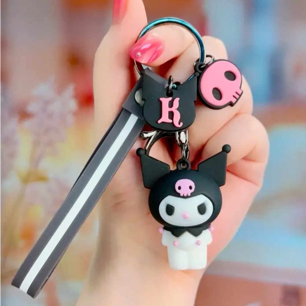 Cute Black and Pink Keychain with Character Charm